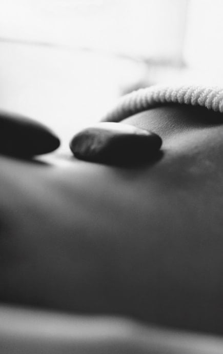 Skin surface with 2 rocks and textured cloth placed on top