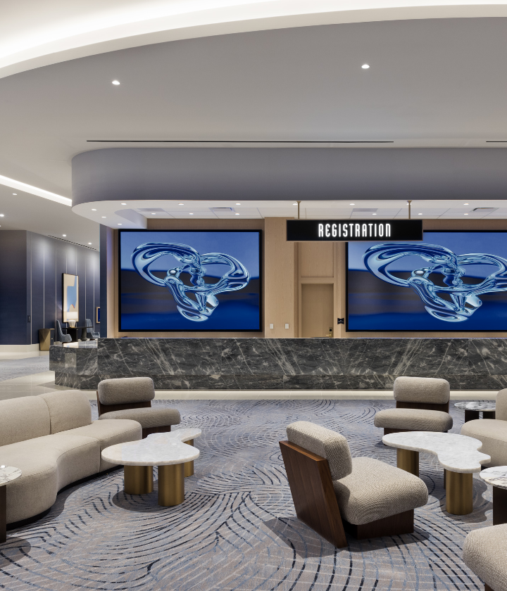 Conference center registration, hallway, and seating areas