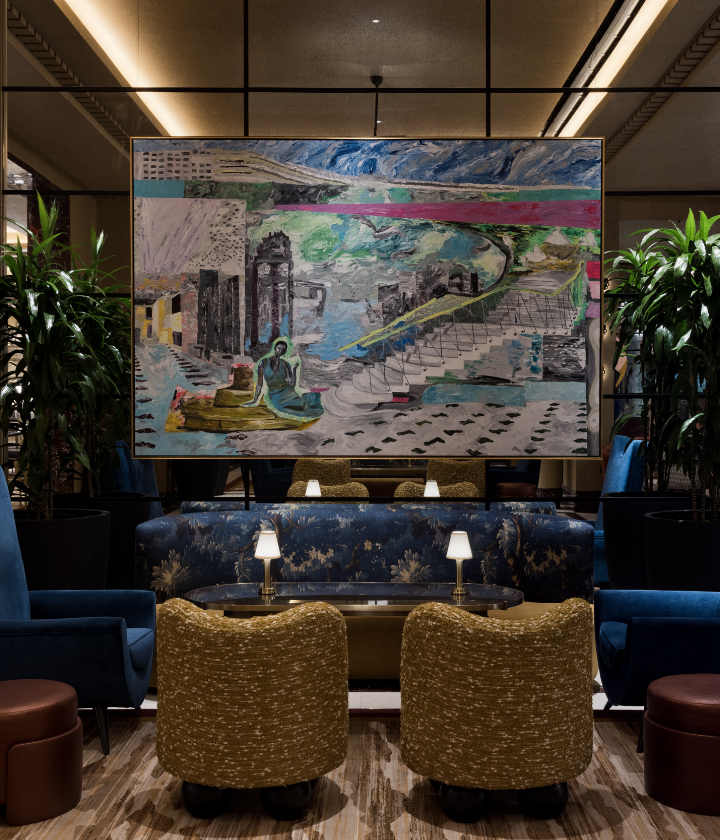 Seating area underneath art piece