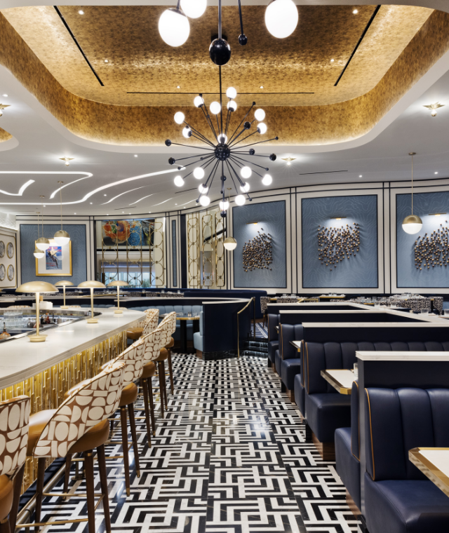 Restaurant booth rows across from bar with seating