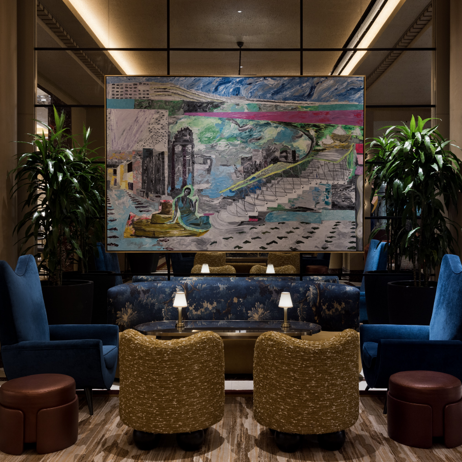 Seating area underneath art piece