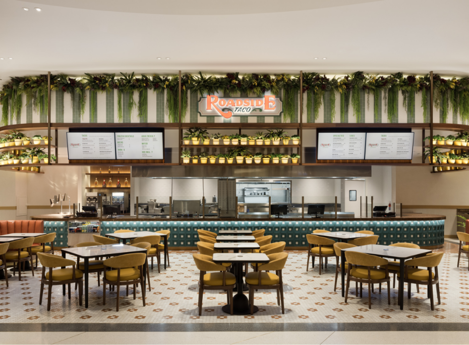 Roadside Taco sign logo in the quick service restaurant area with seating