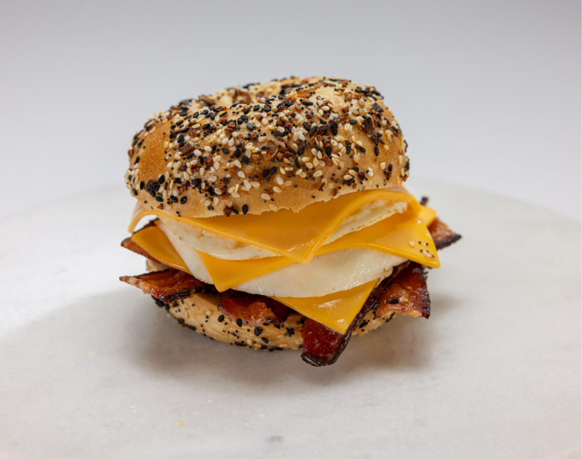 Everything bagel sandwich with eggs, cheese, and bacon