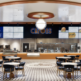 Capon's sign logo in the quick service restaurant area with seating