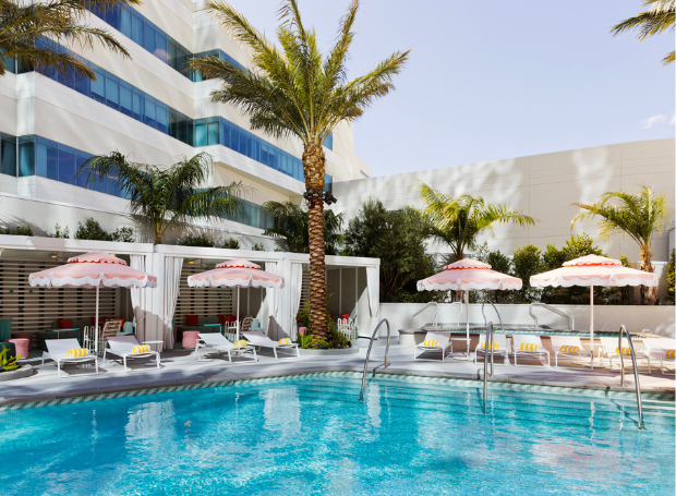 Pool entry and surrounding cabanas