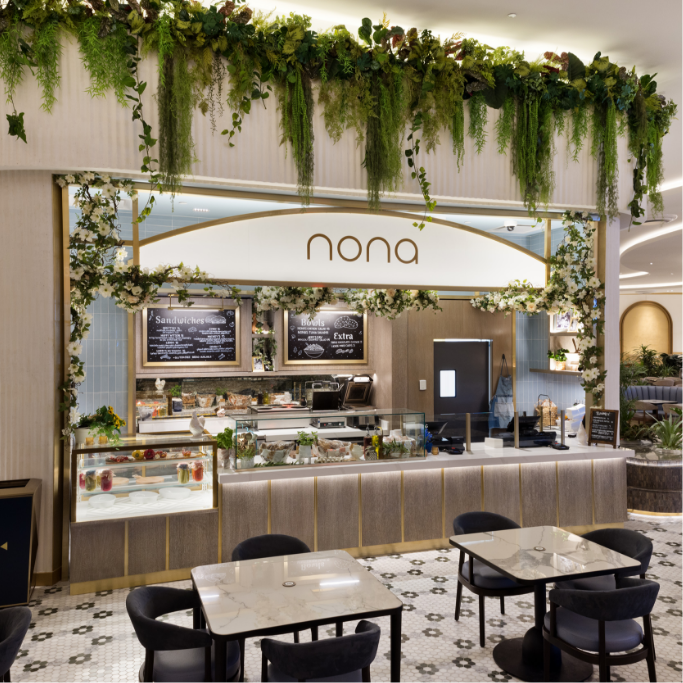 Nona sign logo hanging in the quick service restaurant area with seating