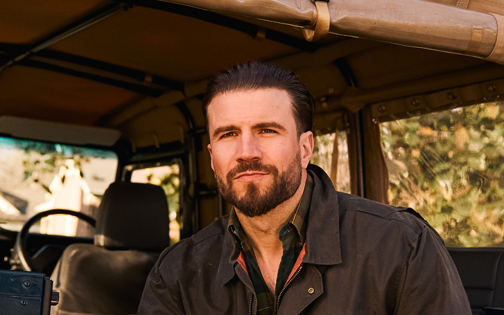 Sam Hunt headshot set in the back of a vehicle