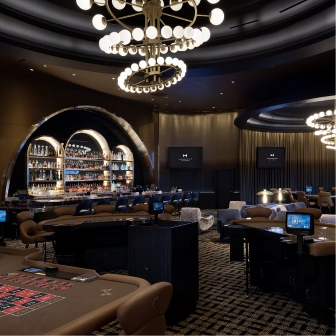 Table games with bar and seating in background