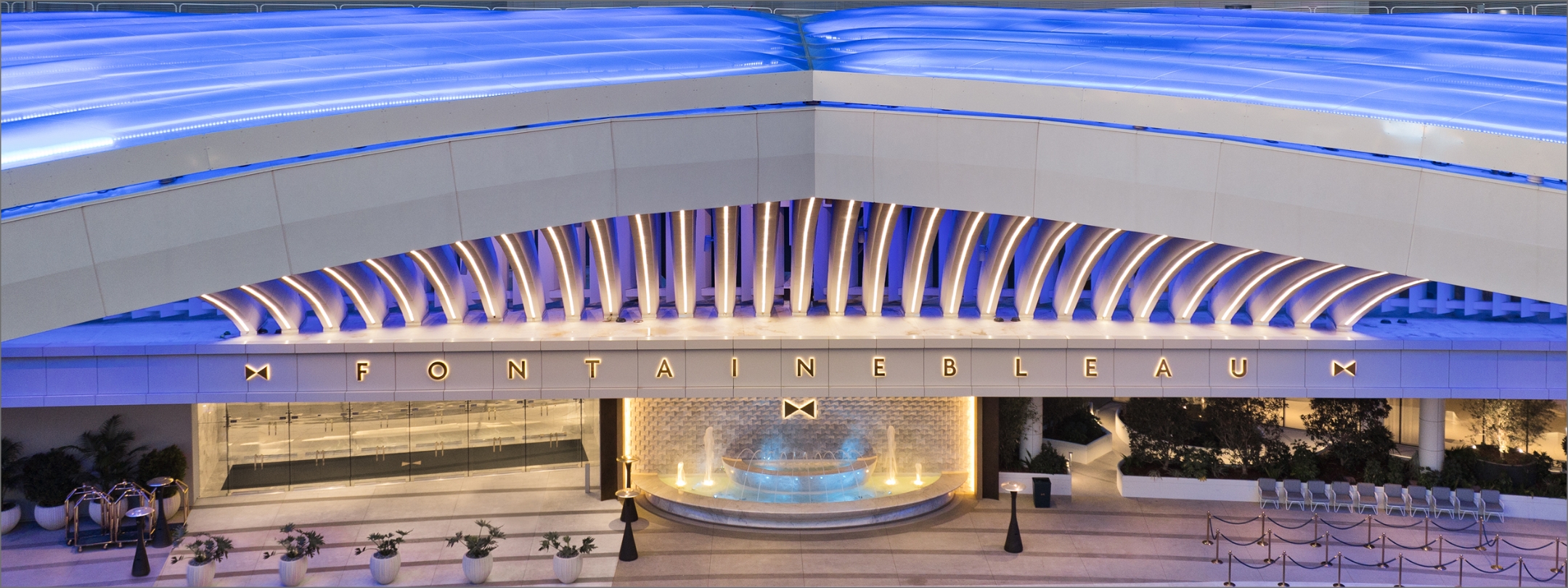 Grand exterior Porte Cochere with Fontainebleau sign and bowtie logo