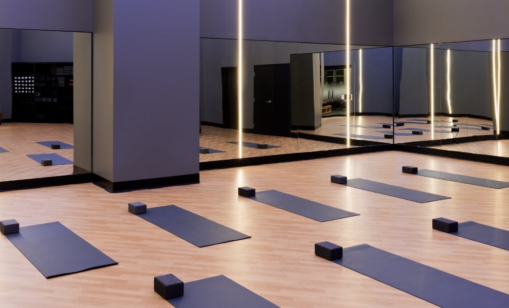 Empty group workout class with yoga mats