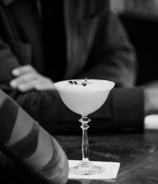 Cocktail with garnish in black and white