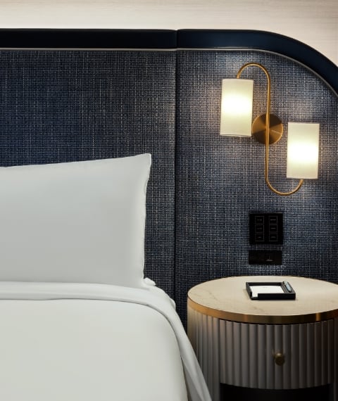 Bed detail with lamps