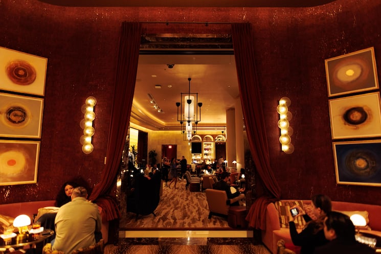 Doorway surrounded by lights and art