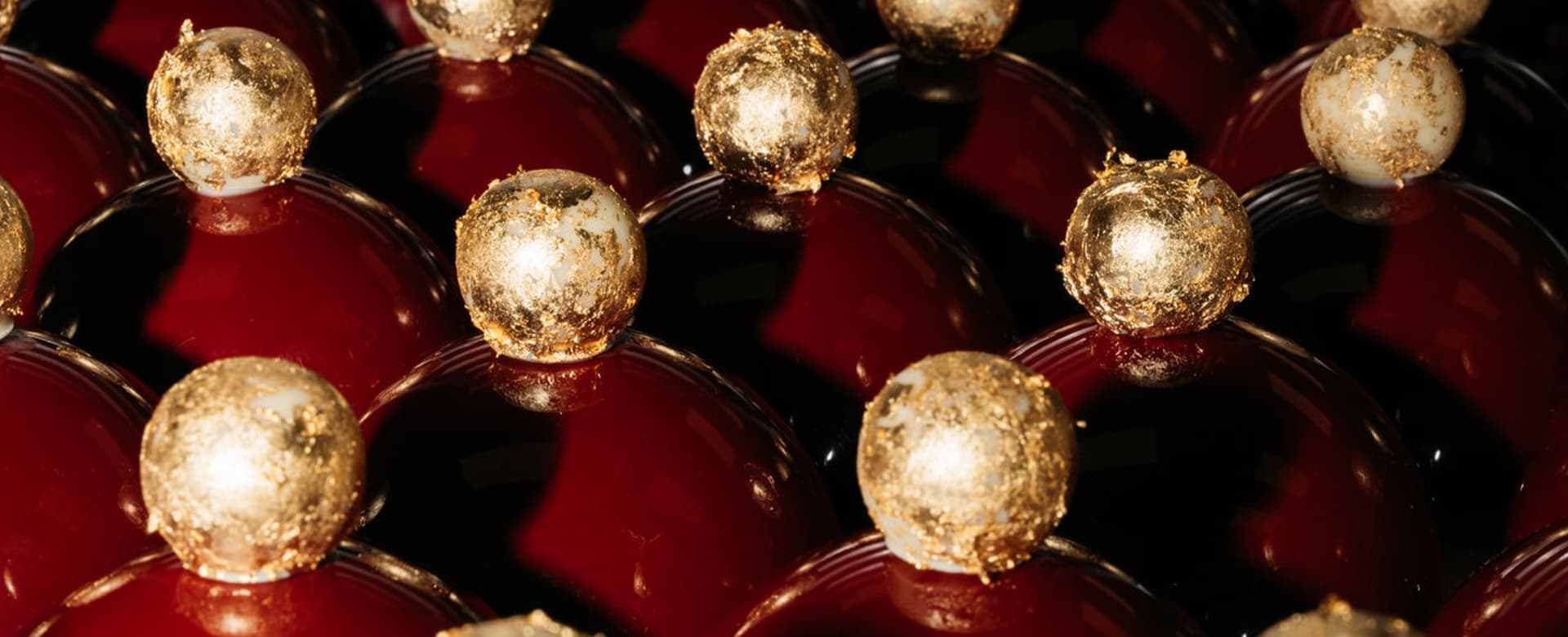 Close up of red & gold ornaments