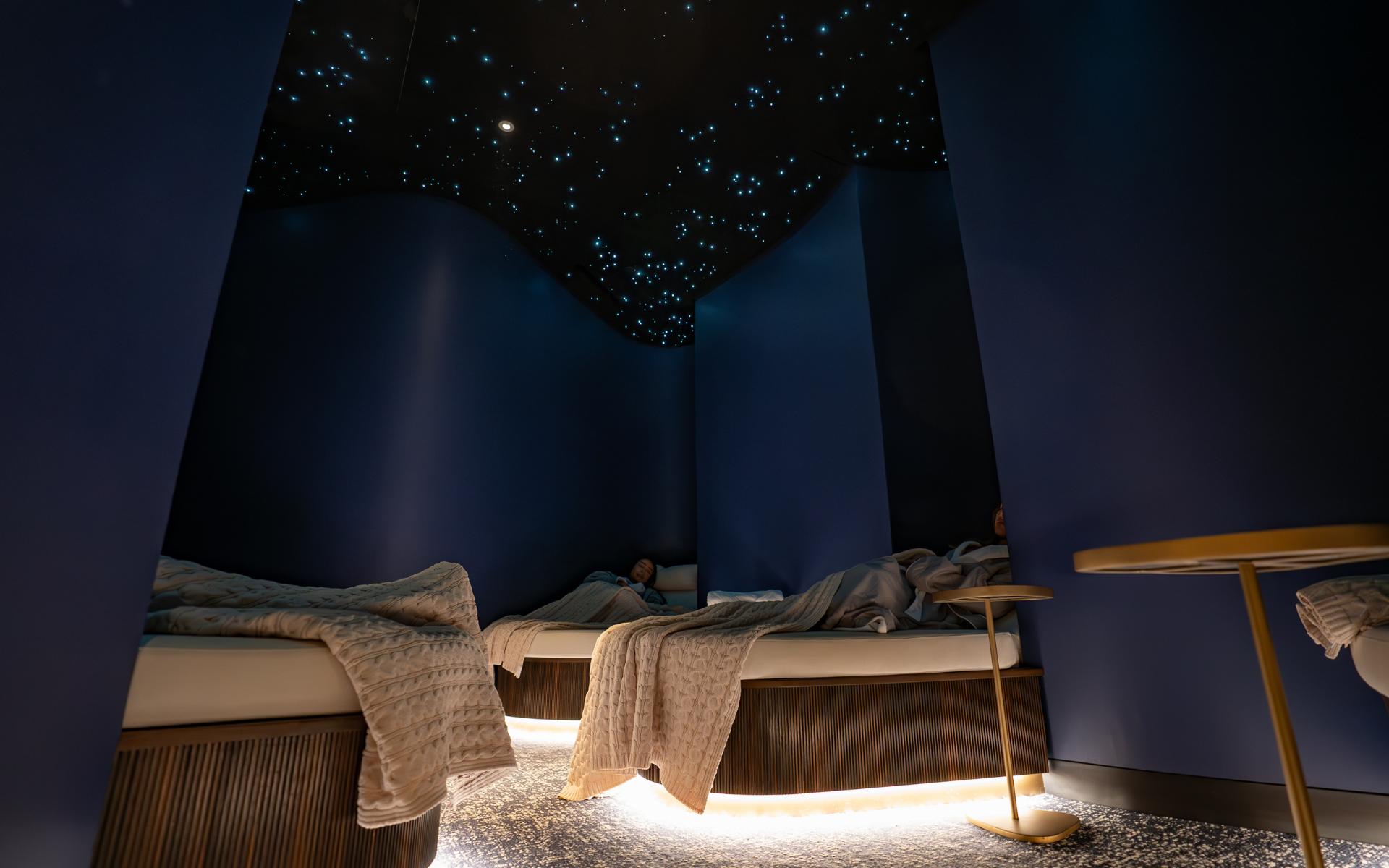 Star gazing room with beds and low lighting