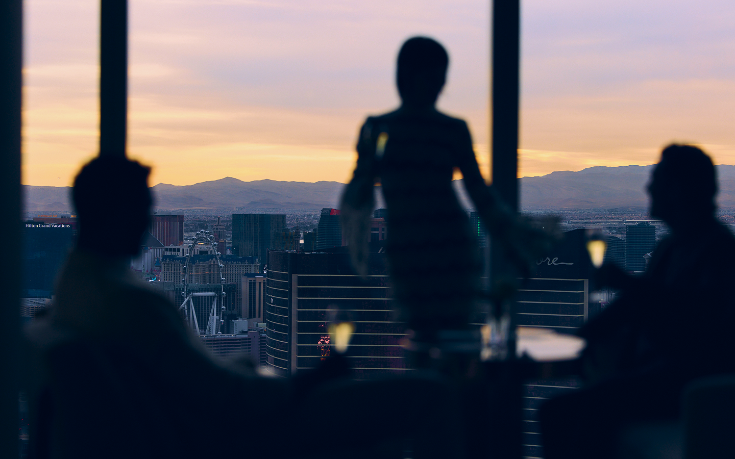 Blurred outline of people in front of Las Vegas Strip in the Poodle Room at Fontainebleau Las Vegas