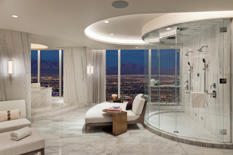 Shower area with seating and view of Las Vegas in the penthouse suite at Fontainebleau Las Vegas