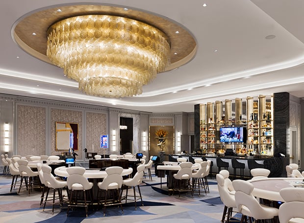 Gambling tables under chandelier in the high limit area at Fontainebleau Las Vegas