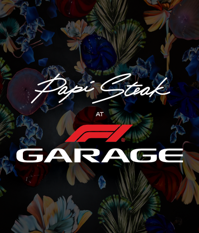 Papi Steak at F1 Garage logo over dark floral background
