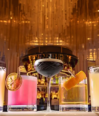 Selection of cocktails with garnishes in Bleau Bar