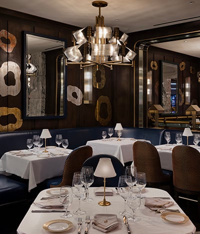 Interior tables in a dining room at Don's Prime