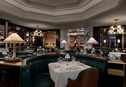 Interior tables in a dining room at Don's Prime