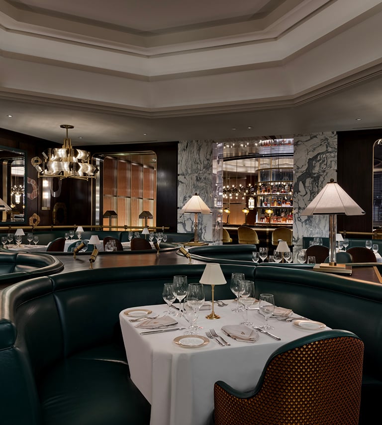 Interior tables in a dining room at Don's Prime