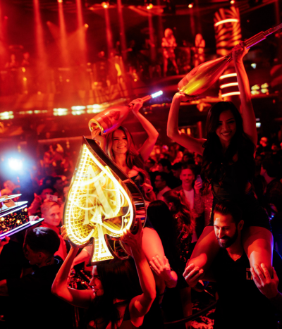 Special bottle service in crowded night club