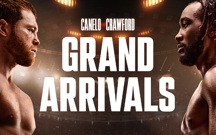 Two boxers staring at each other across text: Grand Arrivals