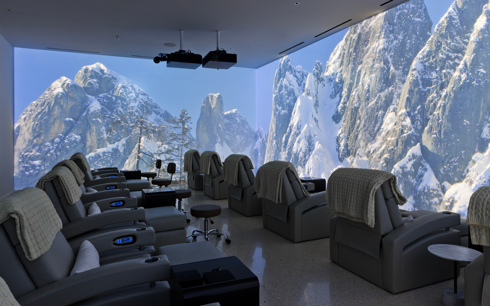 Sitting room area surrounded by LED projection