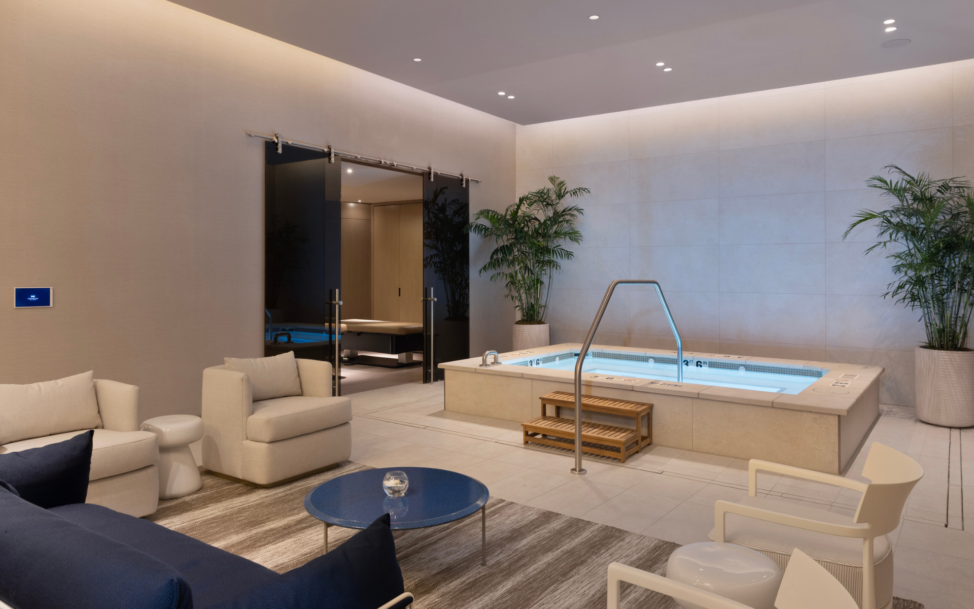 Spa area with pool and seating area