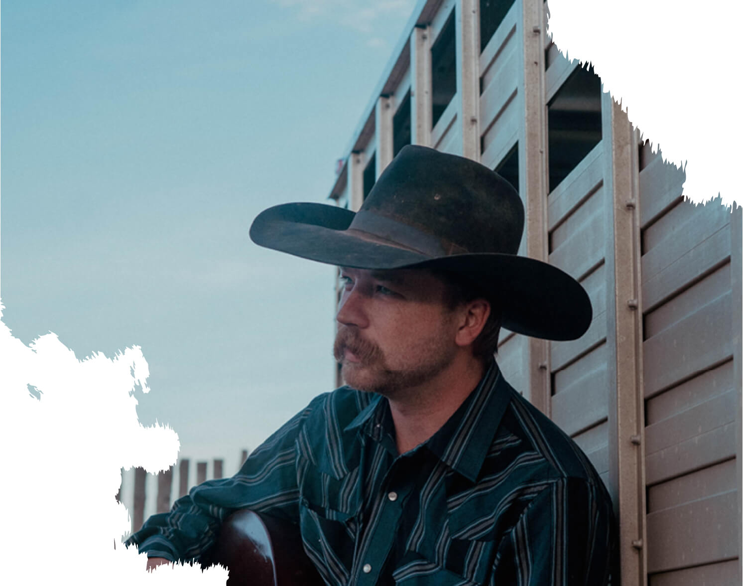 Colter Wall resting against a wall