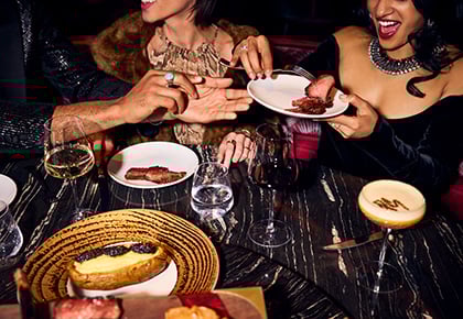 Group of people enjoying a meal