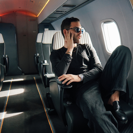 Person sitting in airplane seat