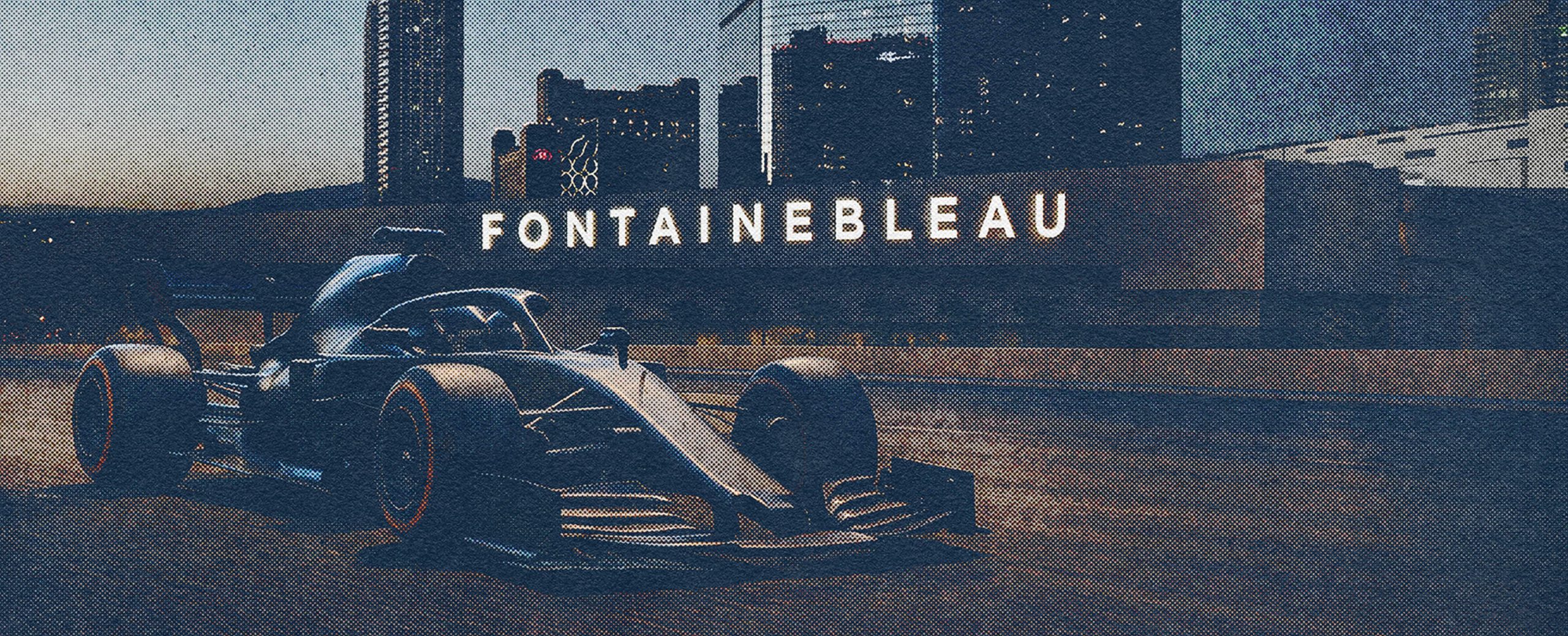 F1 car in front of Fontainebleau neon sign