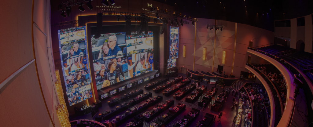 BleauLive theater showing sports with crowd watching