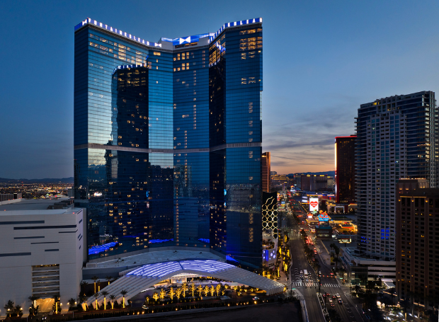 Fontainebleau building exterior with glass-clad structure soaring 67 storeys high on the lively promenade including 3,600 rooms and suites